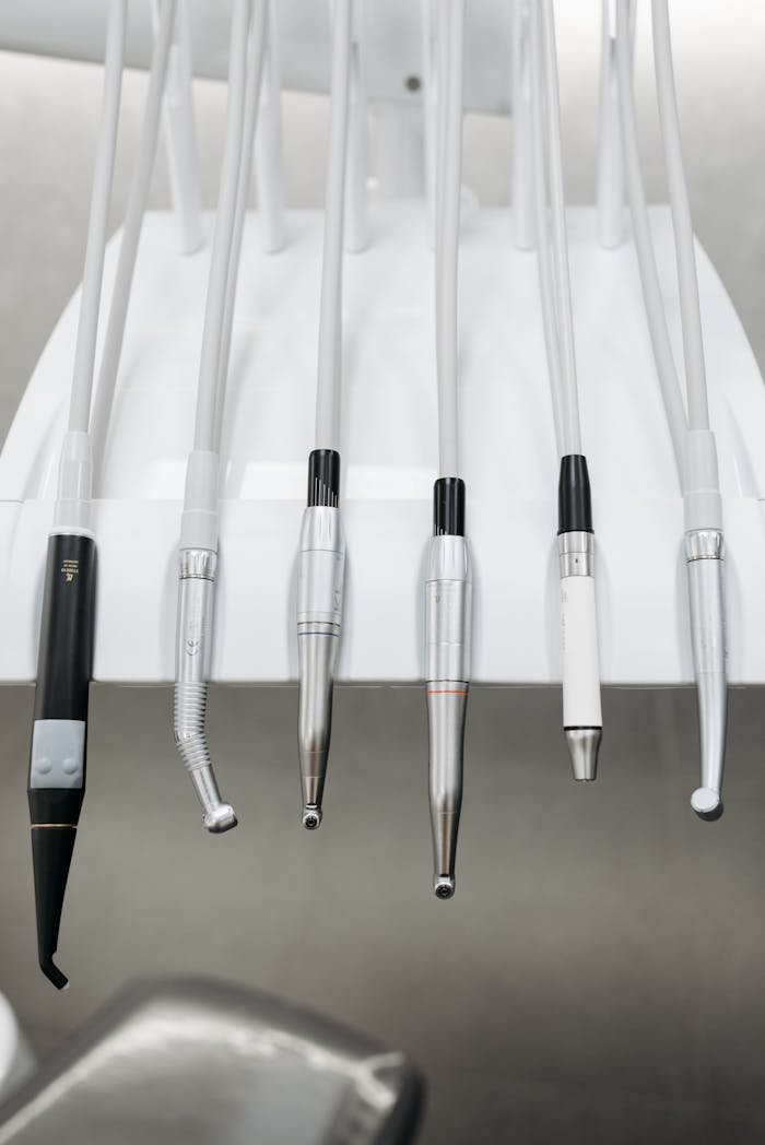 Close-up of modern dental tools in a clean clinic environment.